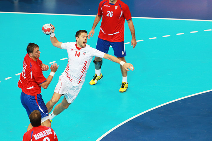 Serbia handball: A Croatian player goes for a shot