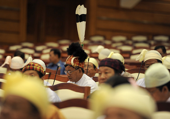 24 hours in pictures: Burmese members of parliament attend the opening