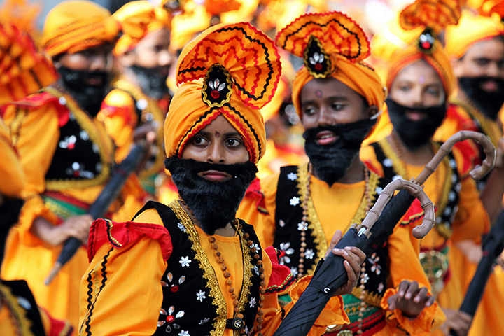 24 hours in pictures: Sri Lankan school children take part in a religious procession