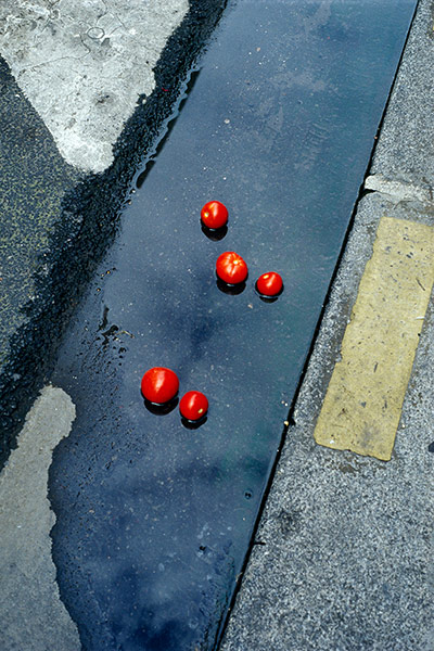 Rencontres Arles 2012: Abandoned tomatoes in street add colour to monochrome graphic lines