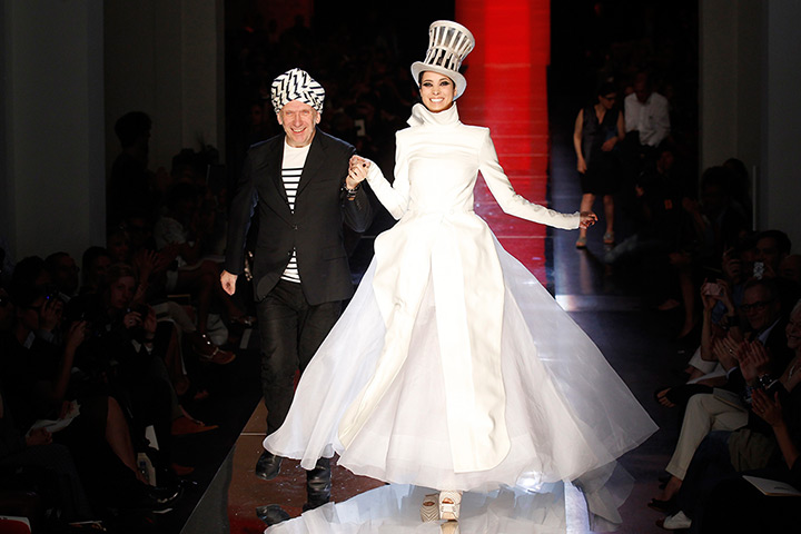 Paris Haute Couture: Jean Paul Gaultier appears with a model at the end of Haute Couture show