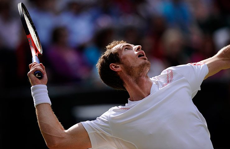 Day 9 Wimbledon: Andy Murray serves at Wimbledon 2012