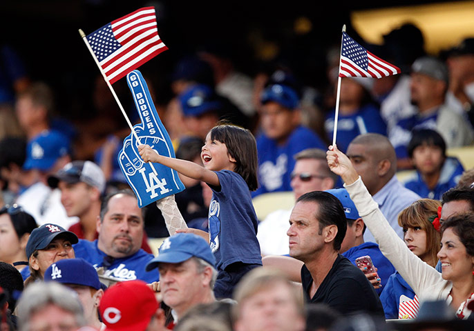 Independence Day: Fans wave American flags on Independence Day