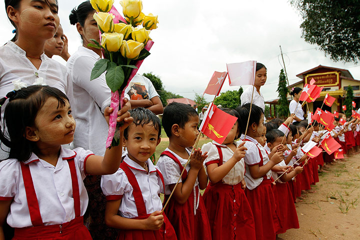 Picture Desk Live: School children await the arrival of Aung San Suu Kyi