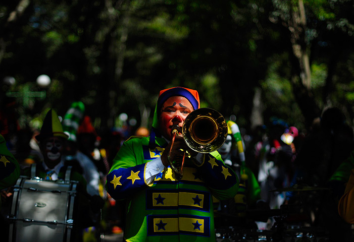 24 hours: A clown participates in an international clown festival in San Salvador
