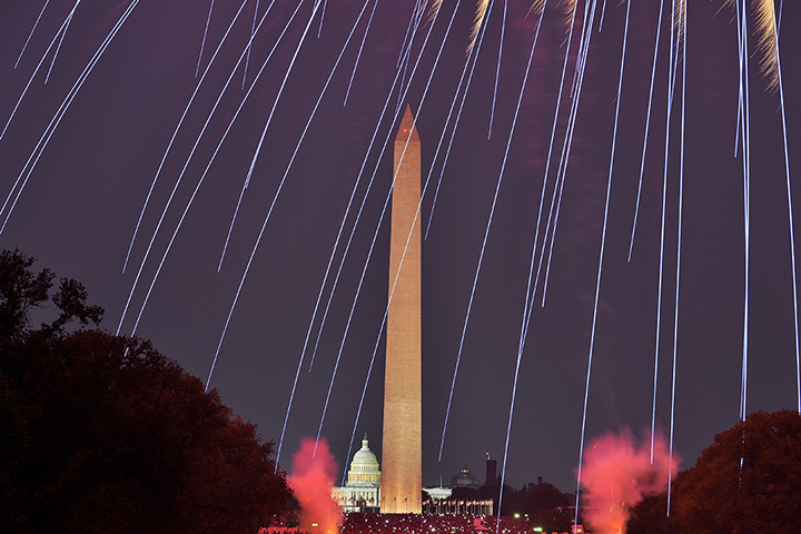 24 hours: Washington, DC, US: Fireworks illuminate the night sky over the Monument