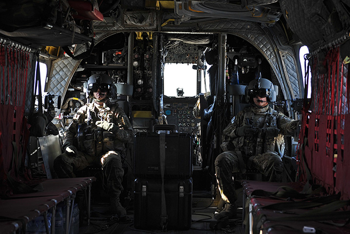 24 hours: Afghanistan: Gunners on board a US CH-47 Chinook helicopter