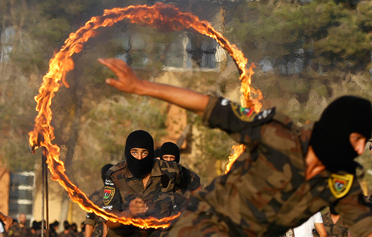 24 hours: Tripoli, Libya: A member of the Libyan special forces performs
