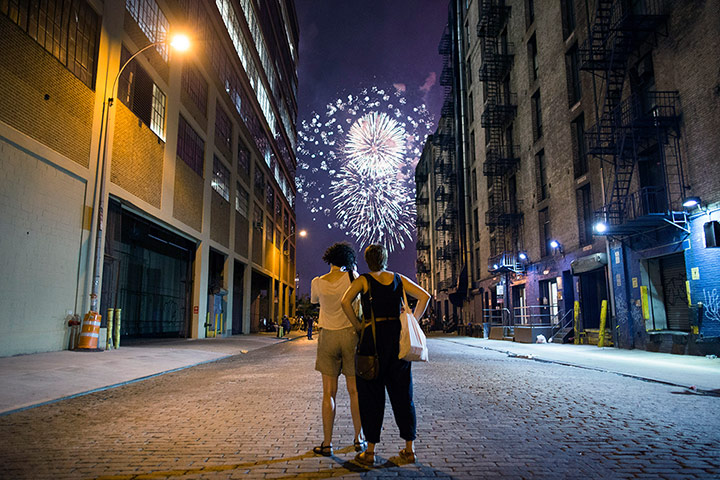 New York fireworks: A couple watch the fireworks over the Hudson