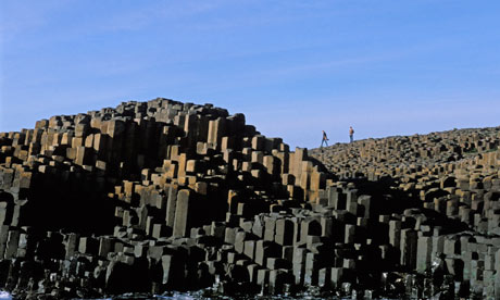 Stacks of largely hexagonal basalt rock form the Giant's Causeway, Northern Ireland.
