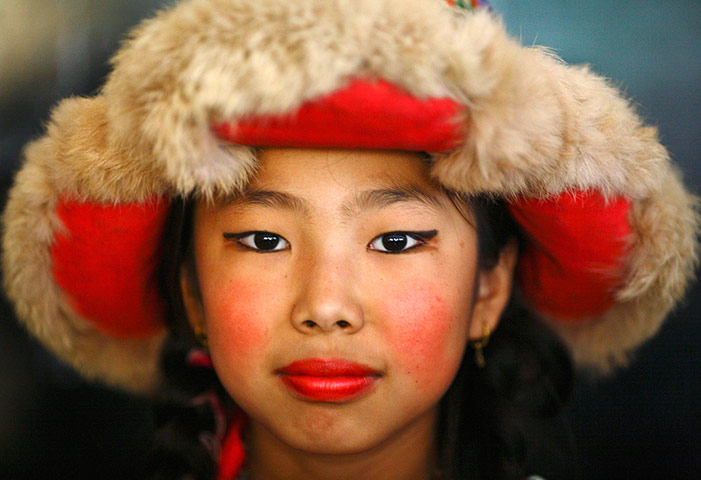 Picture Desk Live: Tibetan girl dressed in traditional attire
