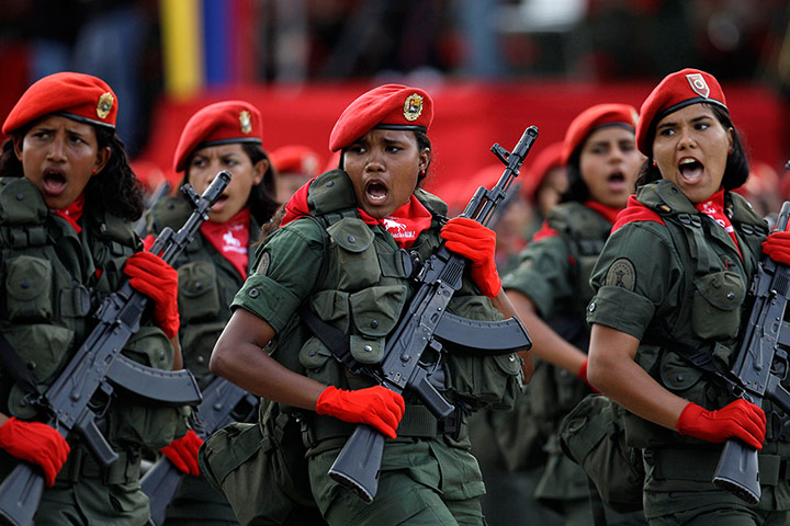 Picture Desk Live: woman soldiers march during a parade marking Venezuela's Independence Day