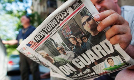 A copy of the New York Post with Katie Holmes on the cover