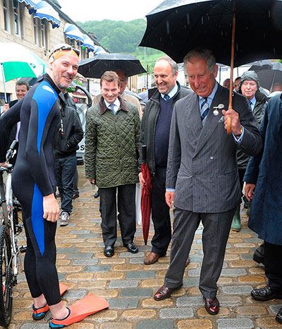 Rain: Prince Charles visits Hebden Bridge