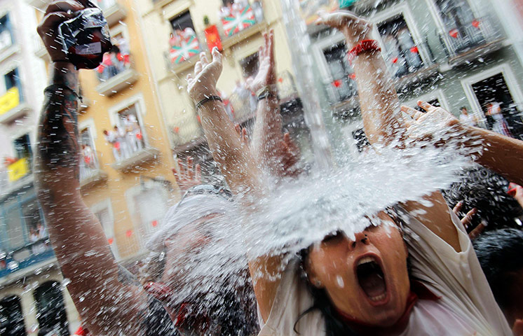Pamplona: Soaked reveller