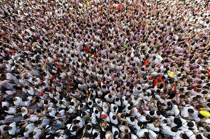 24 Hours: Participants gather to celebrate the 'chupinazo' in Pamplona