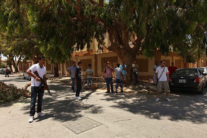 Libya Elections: Citizens take up arms to protect the polling stations in Benghazi