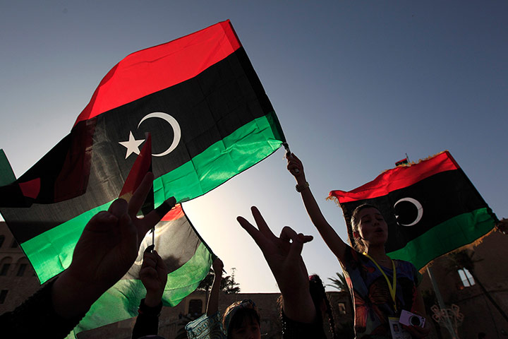 Libya election: Libyans celebrate on the streets of Tripoli's Martyrs Square