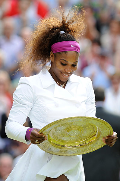 Wimbledon day 12: A beaming Serena Williams gazes at the trophy 