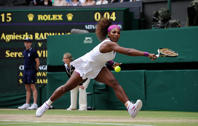 Wimbledon day 12: Serena Williams stretches to reach a backhand early in the game