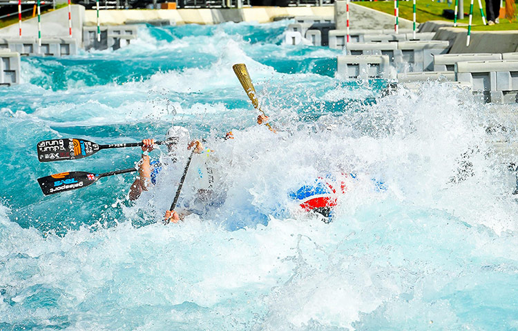 Olympic flame: Zachary Franklin carries the Olympic Flame