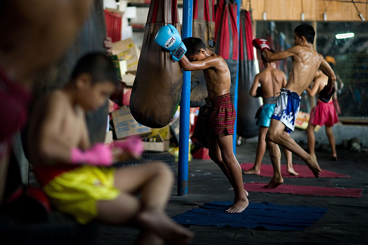  24 hours: Bangkok, Thailand: Students from 96 Penang, a Muay Thai boxing camp train