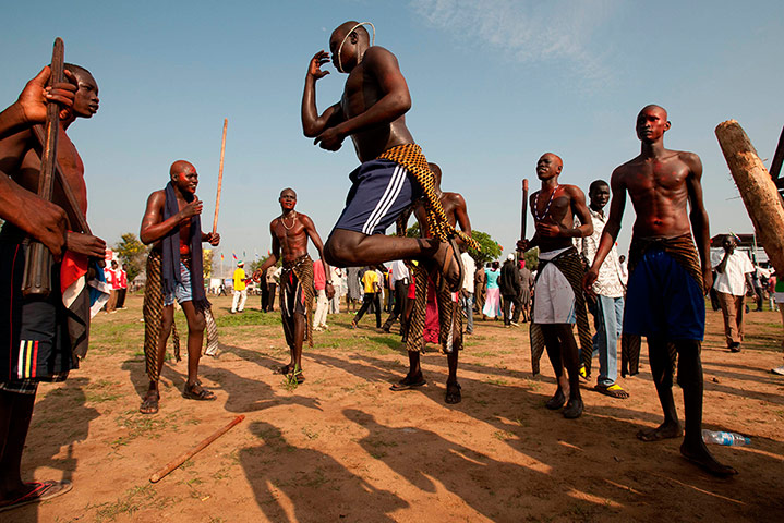 Picture Desk Live: Southern Sudanese men dance in Juba
