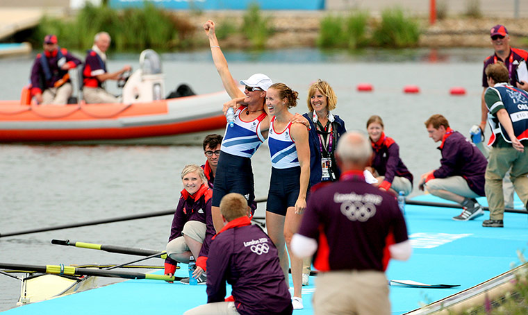 Glover and Stanning: Stanning and Glover wave to the crowd