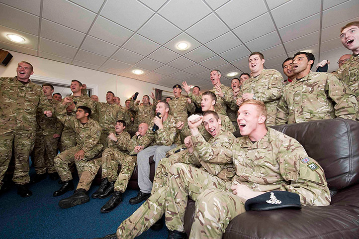 Glover and Stanning: Members of 32nd Regiment Royal Artillery cheer on Captain Heather Stanning