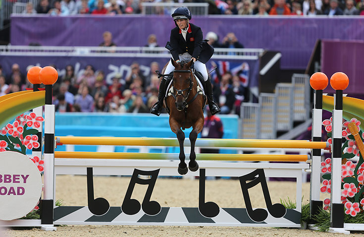Female olympic medalists: Zara Phillips goes over the fence in the final round of the Team eventing