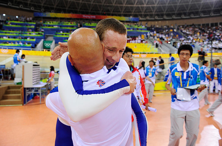 Wiggo Olympic medals : Bradley Wiggins celebrates with performance director Dave Brailsford