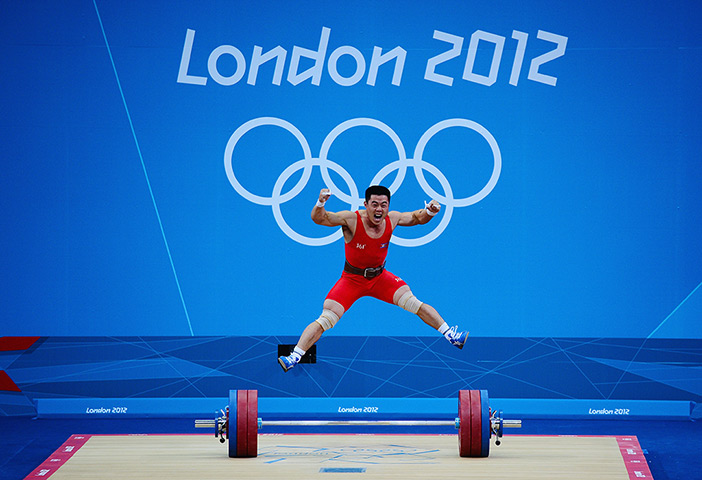 Olympic reactions: Un Guk Kim of DPR Korea celebrates making a world record