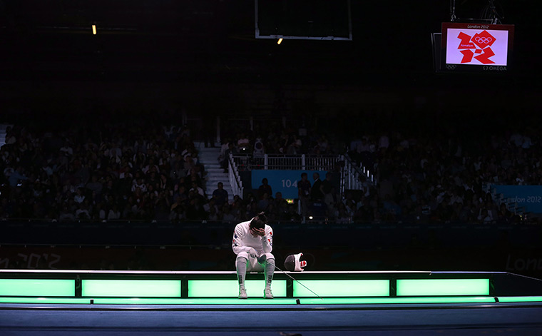 Olympic reactions: A Lam Shin of South Korea reacts after losing Epee semi final