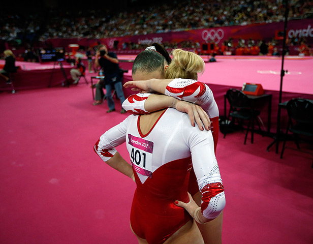 Olympic reactions: Gymnast Aliya Mustafina comforts Kseniia Afanaseva
