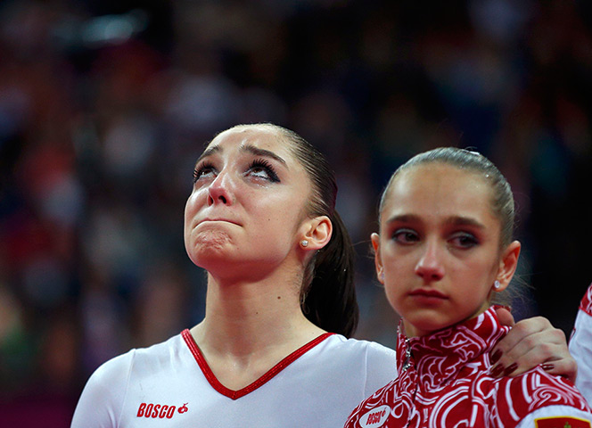 Olympic reactions: Aliya Mustafin and Victoria Komova during the women's gymnastics team final
