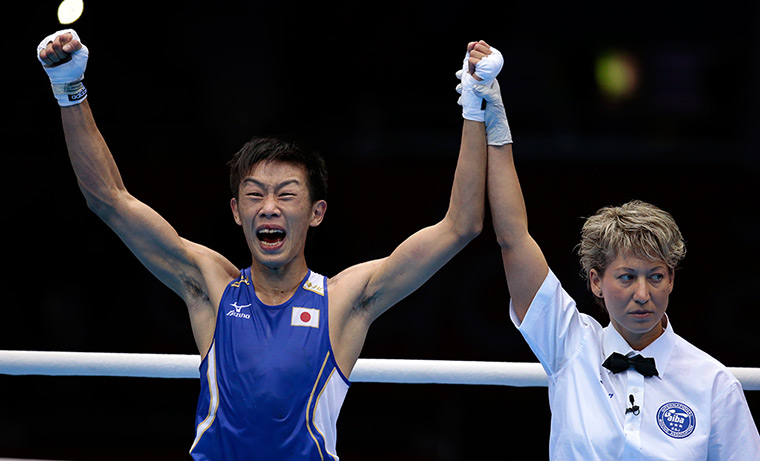 Olympic reactions: Japan's Satoshi Shimizu reacts bantam weight 56-kg preliminary boxing match