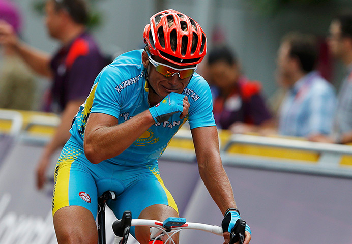 Olympic reactions: Alexandr Vinokurov reacts after winning the men's cycling road race 
