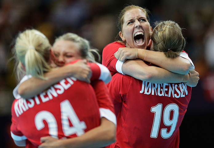 Olympic reactions: Camilla Dalby of Denmark celebrates with team mates women's handball