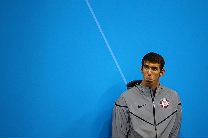 Olympic reactions: Michael Phelps receiving his silver medal for Men's 200m Butterfly final