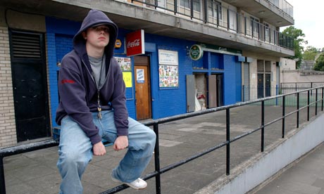 Young boy hanging around the streets
