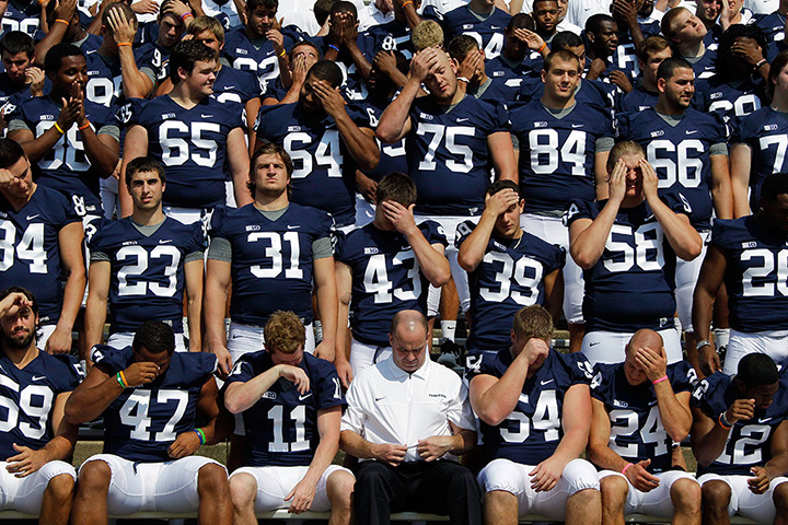 24 hours in pictures: Penn State NCAA college football team pose for photo