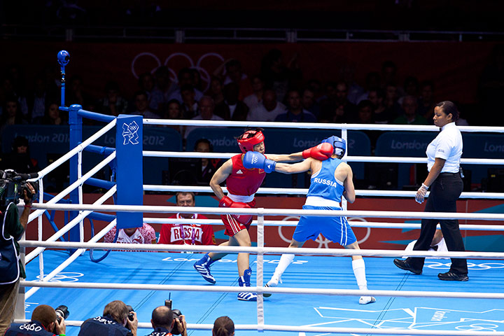 Boxing: Ren Cancan of China in Red and Elena Savelyeva of Russia in Blue