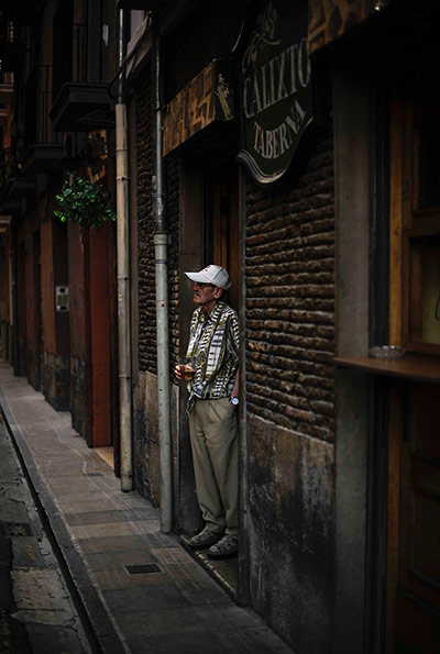 24 hours: A man enjoys a beer in the old city in Pamplona, Spain