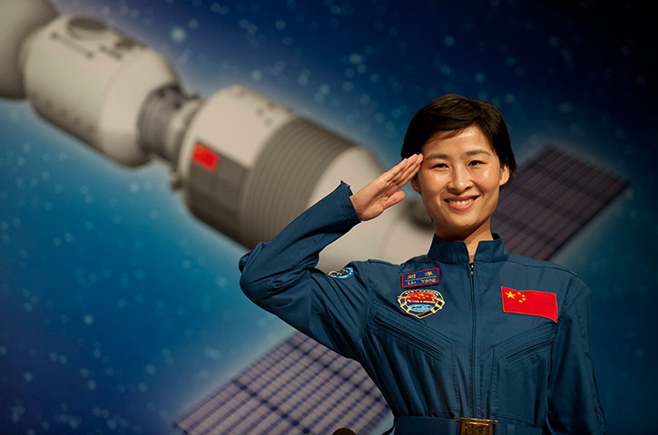 24 hours: China's first woman astronaut Liu Yang salutes at a press conference