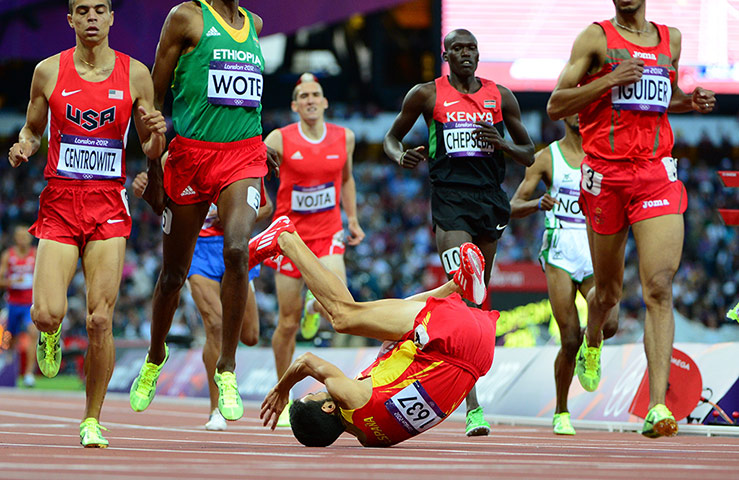 blunders gallery: Spain's Diego Ruiz (C) falls during in t