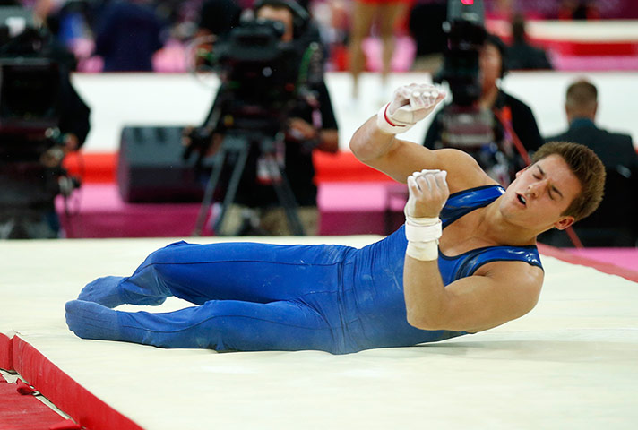 blunders gallery: U.S. gymnast Samuel Mikulak falls during a performance 