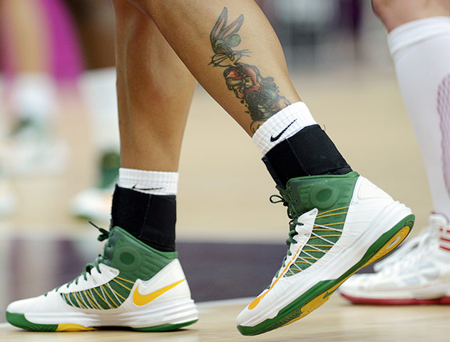 tattoos: A tattoo is seen on the leg of a Brazilian basketball player