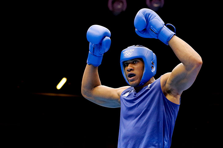 medal: Anthony Joshua of Great Britain celebrates