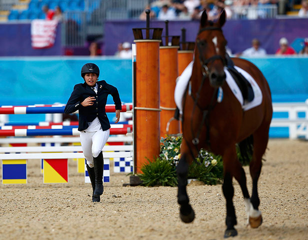 Pentathlon: Mexico's Tamara Vega runs after her horse 