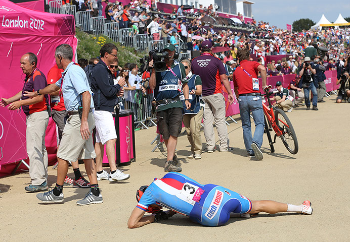 Olympic Mountain Biking: Jaroslav Kulhavy collapsed on the ground after crossing the finish line